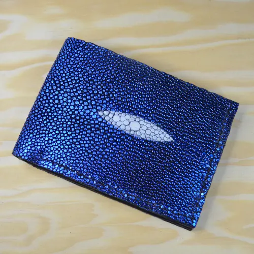 Slim wallet in electric blue stingray with the white eye centered